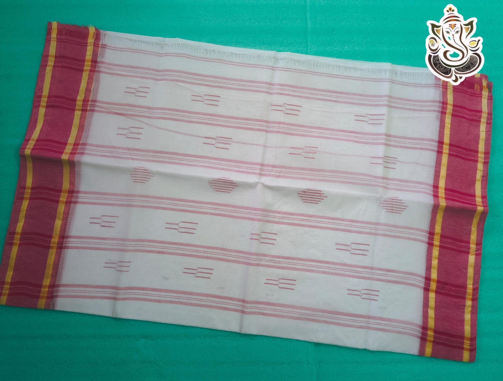This saree features intricate buti designs and is made from cotton with hand weaving work.
Product Details:
- Material: Cotton
- No Blouse Piece