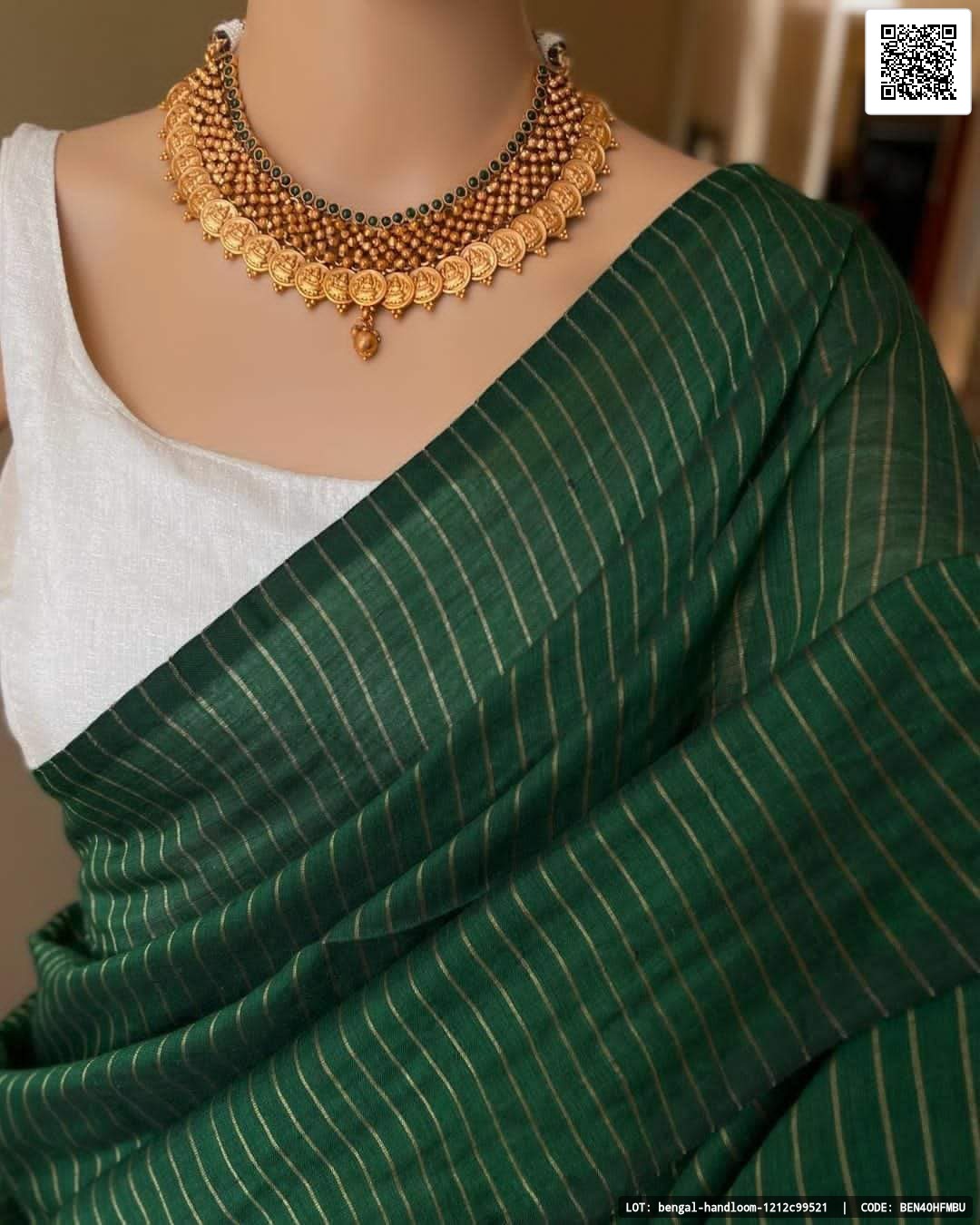 Strips khadi saree with a matching blouse piece.