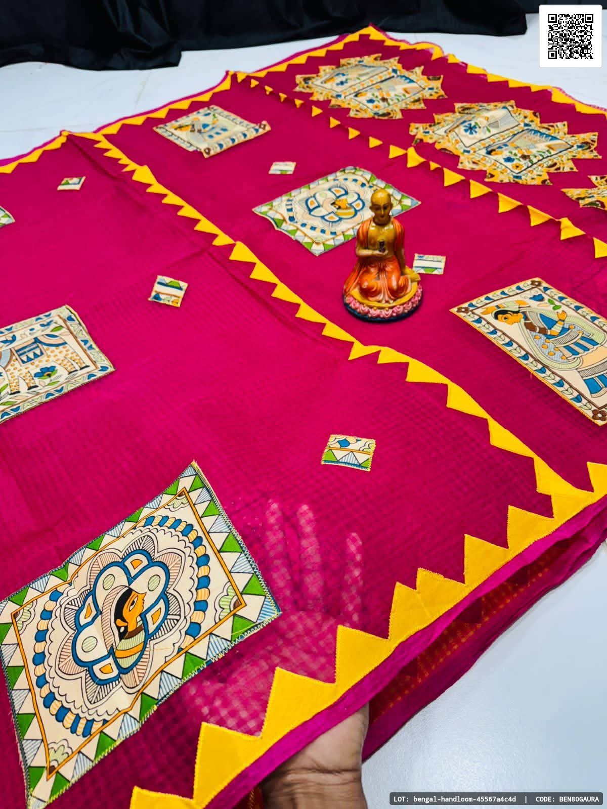 Madhubani print applik saree crafted from Resham Kota material. A vibrant choice for festive occasions and gatherings.