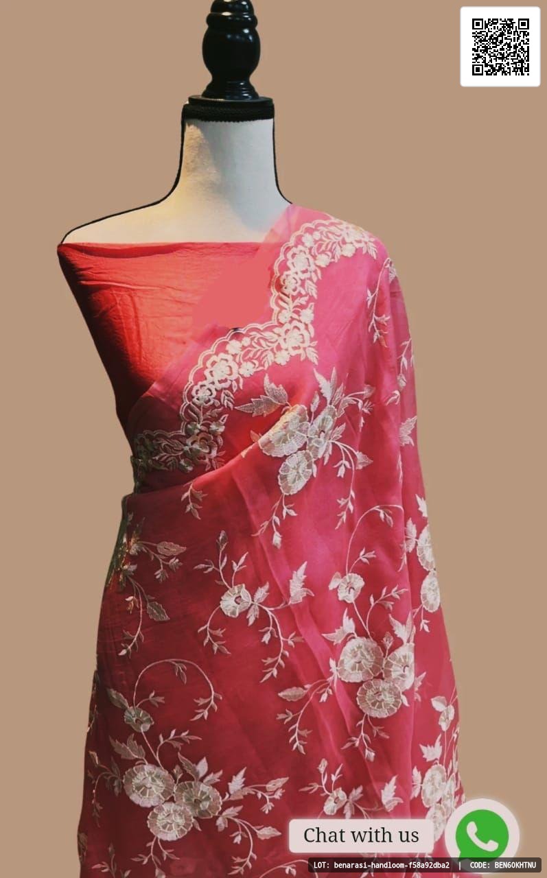 Pure organza silk saree featuring floral designs with scallops embroidery and a flower jall body. The saree comes with an organza blouse with an embroidered border. Customization is available in any color.
