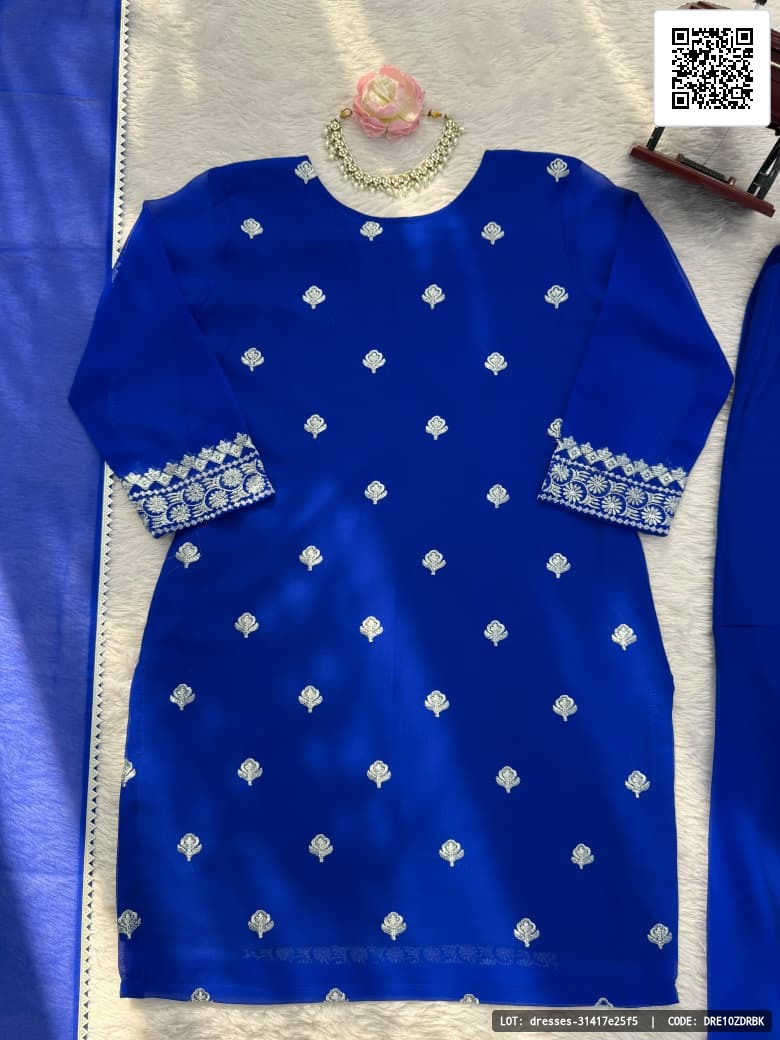 Designer sharara set crafted in classy tones with premium fabric and detailing. The set includes a top, sharara, and dupatta, making it a perfect choice for festive celebrations and weddings.

Product Details:
- Top Fabric: Faux Georgette
- Top Lining: Soft micro cotton
- Top Work: Intricate thread work
- Top Size: M(38), L(40), XL(42), XXL(44) with 3XL margin
- Sharara Fabric: Faux Georgette
- Sharara Lining: Soft micro cotton
- Sharara Work: Plain
- Sharara Size: Fully stitched, fits up to size 44 (elastic waistband)
- Dupatta Fabric: Faux Georgette
- Dupatta Work: 4 side fancy lace
- Dupatta Length: 2.10 meters
- Total Weight: Approx. 1 kg
- Occasion: Festive celebrations, weddings, elegant occasions