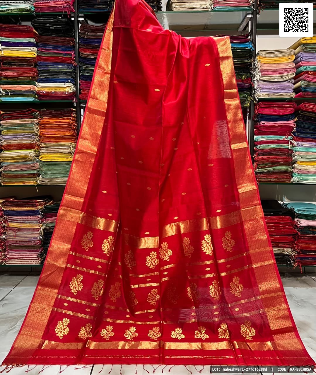 Traditional pure Maheshwari handloom saree featuring three lines buta buti design. Crafted from half silk and half cotton, this saree is recommended for dry clean only. The length is 5.5 metres with a blouse piece of 0.80 metres and a width of 46 inches.